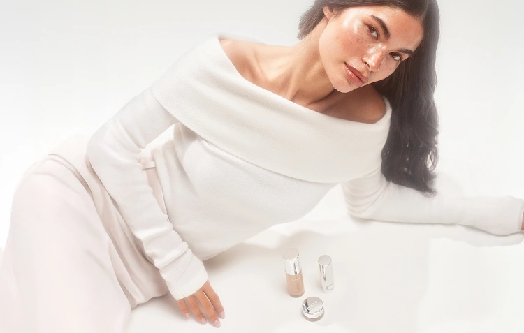 Woman wearing Wake me up complexion enhancer and Wake me up cream